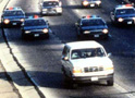O. J. Simpson slowly evades police in a friend's white Ford Bronco