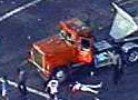Reginald Denny lays next to his truck after being beaten during the Los Angeles riots
